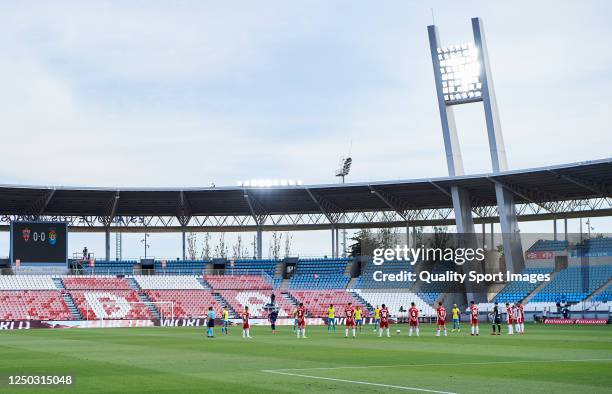 Almeria and UD Las Palmas players observe a minute´s silence to commemorate the victims of the coronavirus pademic prior to the La Liga Smartbank...