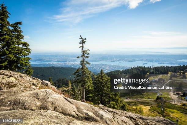 vancouver urban skyline. - vancouver city and mountains stock pictures, royalty-free photos & images
