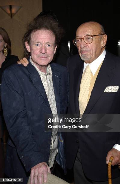 View of Rock musician Jack Bruce and Atlantic Records President and co-founder Ahmet Ertegun as they pose together during an after-party at the Four...
