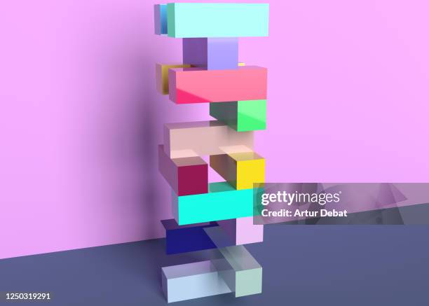 colorful blocks stack each other in impossible balance. - rubiks kub bildbanksfoton och bilder