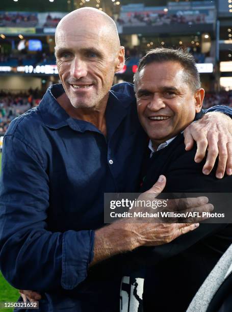 Tony Lockett and Nicky Winmar are seen during the 2023 AFL Round 03 match between the St Kilda Saints and the Essendon Bombers at the Melbourne...