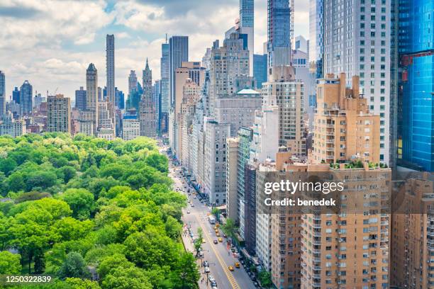 central park und 59th street manhattan new york city usa - manhattan new york city stock-fotos und bilder