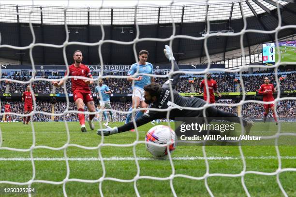 Julian Alvarez of Manchester City scores to make it 1-1 during the Premier League match between Manchester City and Liverpool FC at Etihad Stadium on...