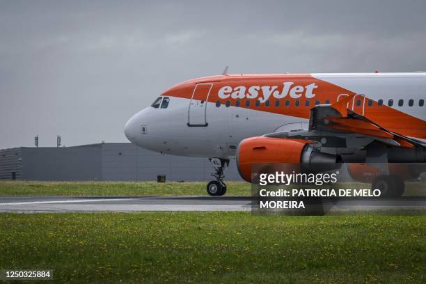 An easyJet airline aircraft taxies prior to taking off at Humberto Delgado airport in Lisbon on April 1, 2023. - The Portuguese cabin crew of the...