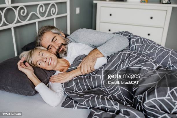 mature couple is sleeping - couple resting stock pictures, royalty-free photos & images