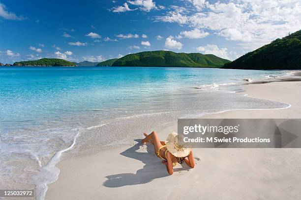 woman tropical beach vacation - antigua stock-fotos und bilder