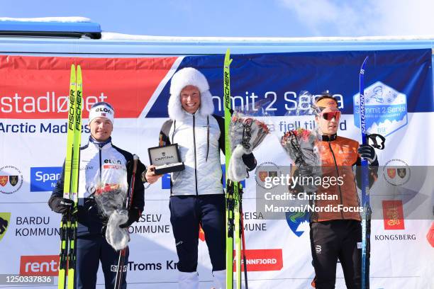 Second placed Eirik Sverdrup Augdal of Norway, race winner Martin Loewstroem Nyenget of Norway and third placed Andrew Musgrave of Great Britain...