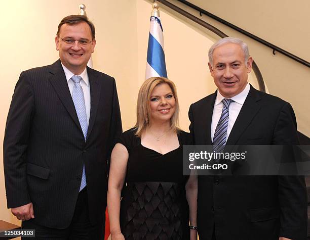 In this handout image supplied by the Israeli Government Press Office , Israeli Prime Minister Benjamin Netanyahu and his wife Sara greet Czech Prime...