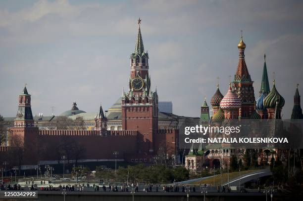 This photograph taken on April 1 shows a view of the Kremlin with Spasskaya Tower and St. Basil's Cathedral in downtown Moscow.