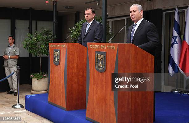 Israeli Prime Minister Benjamin Netanyahu speaks during a joint press conference with his counterpart Czech Prime Minister Petr Necas at Netanyahu's...