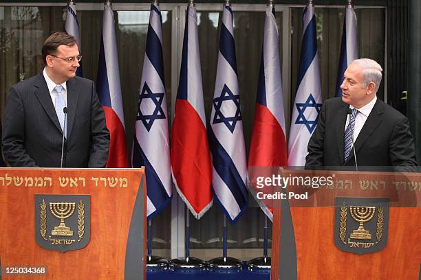 Israeli Prime Minister Benjamin Netanyahu speaks during a joint press conference with his counterpart Czech Prime Minister Petr Necas at Netanyahu's...
