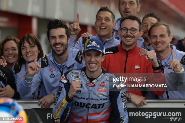 Ducati Spanish rider Alex Marquez celebrates with teammates after getting the pole position in the Argentina Grand Prix MotoGP qualifying session, at...