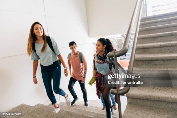 university students arriving to campus - back to school college stock pictures, royalty-free photos & images