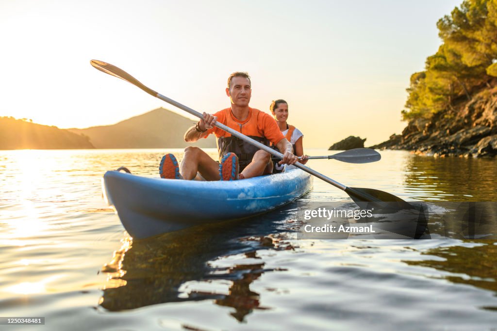 Kayakers Enjoying Healthy Lifestyle in Mediterranean at Dawn