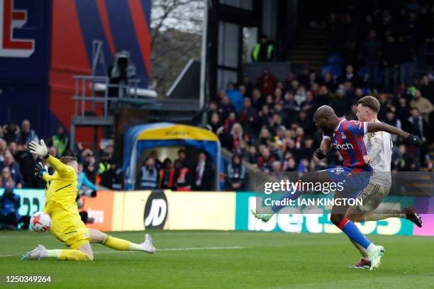 Crystal Palace's French-born striker Jean-Philippe Mateta shoots and scores his team second goal during the English Premier League football match...