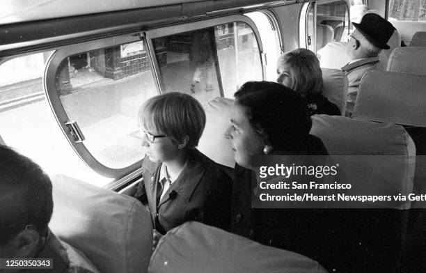Gray Line bus takes tourists on a "Hippie Tour" through the Haight-Ashbury District in San Francisco on April 26, 1967.