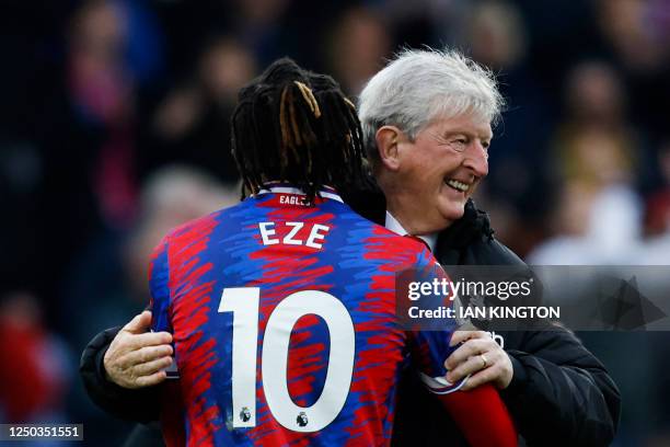 Crystal Palace's English manager Roy Hodgson celebrates with Crystal Palace's English midfielder Eberechi Eze at the end of the English Premier...