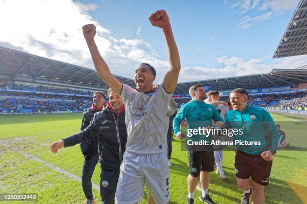 Ben Cabango of Swansea City celebrates in front of away fans after the Sky Bet Championship match between Cardiff City and Swansea City at the...