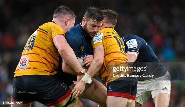 Dublin , Ireland - 1 April 2023; Robbie Henshaw of Leinster is tackled by Harry Sheridan, left, and Tom Stewart of Ulster during the Heineken...