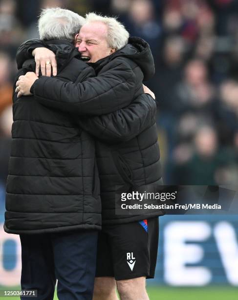 Manager Roy Hodgson of Crystal Palace and assistant manager Ray Lewington of celebrates during the Premier League match between Crystal Palace and...