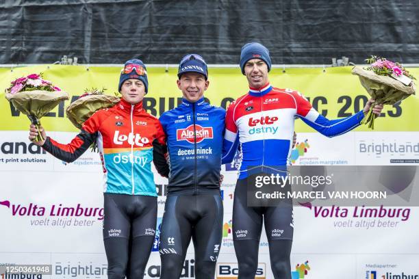 Second placed Lotto-Dstny's Van Gils, winner Alpecin-Deceuninck's Australian rider Kaden Groves and third placed Dutch Pascal Eenkhoorn pose on the...