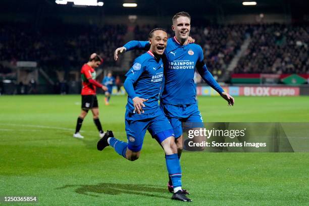 Joey Veerman of PSV celebrates 0-3 with Xavi Simons of PSV during the Dutch Eredivisie match between NEC Nijmegen v PSV at the Goffert Stadium on...