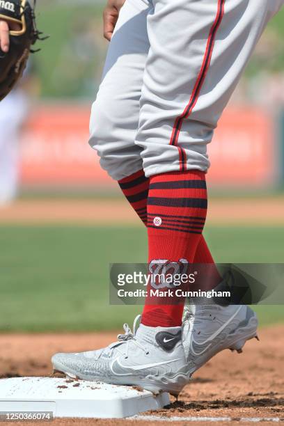 Detailed view of the Stance brand socks and Nike shoes worn by Victor Robles of the Washington Nationals while running the bases during the Spring...