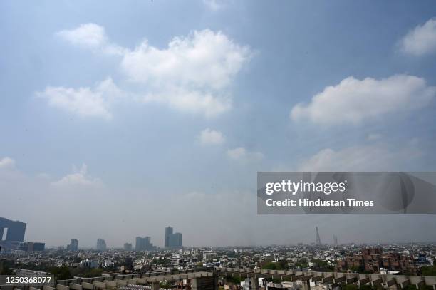 Clear blue skies were seen after a drop in air pollution levels and increased visibility of the city skyline after last night's rain, on April 1,...