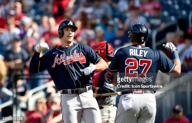 Atlanta Braves first baseman Matt Olsen celebrates with third baseman Austin Riley after his first inning home run during the Atlanta Braves versus...