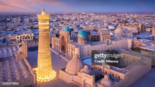 bukhara uzbekistan kalyan minaret och madressa sunset twilight panorama - minaret bildbanksfoton och bilder