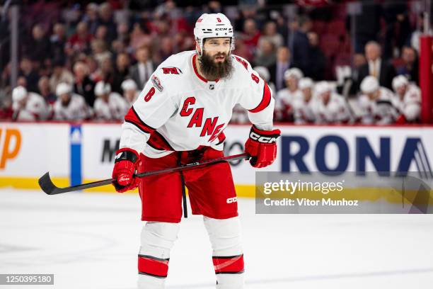 Brent Burns of the Carolina Hurricanes looks on during the first period of the NHL regular season game between the Montreal Canadiens and the...