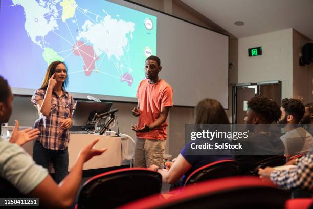 presenting to classmates - group of people using sign language stock pictures, royalty-free photos & images