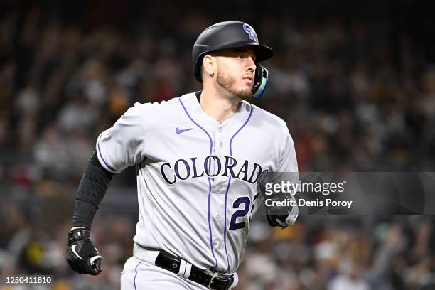 Cron of the Colorado Rockies rounds the bases after hitting a two-run home run during the sixth inning of a baseball game against the San Diego...
