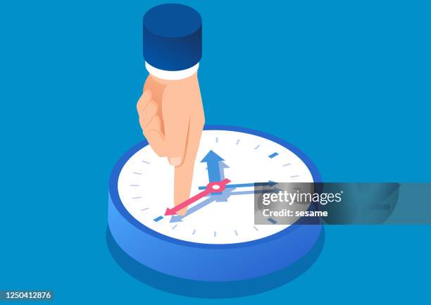 a huge index finger prevents the second hand from moving, a concept illustration of time management - tighten stock illustrations