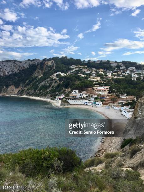 mediterranean coast landscape, cala barraca (portixol), region of valencia, spain - javea stock pictures, royalty-free photos & images