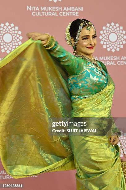 In this picture taken on April 1 Bollywood actress Rekha poses for pictures during the inauguration of the Nita Mukesh Ambani Cultural Centre at the...