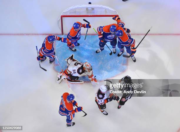 Leon Draisaitl of the Edmonton Oilers celebrates after his first goal of the second period against the Anaheim Ducks with Evander Kane, Kailer...