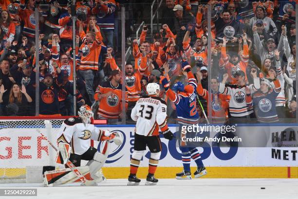 Leon Draisaitl of the Edmonton Oilers celebrates after scoring his third goal of the game against the Anaheim Ducks and 50th goal of the season on...