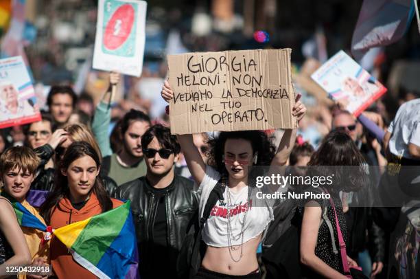 People take part in a rally on the occasion of the International Transgender Day of Visibility in the city center of Rome, Italy, 01 April 2023....