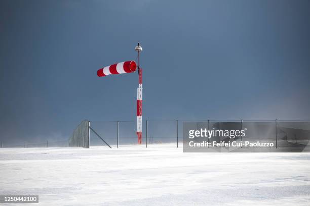 a windsock at vardø, northern norway - windsock stock pictures, royalty-free photos & images