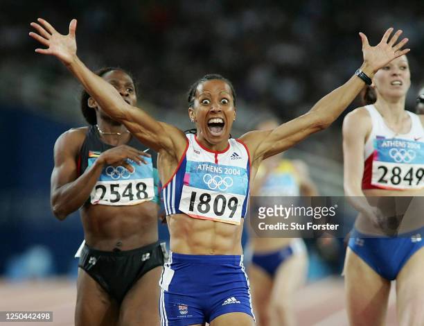 Kelly Holmes of Great Britain celebrates after she won gold in the women's 800 metre final on August 23, 2004 during the Athens 2004 Summer Olympic...