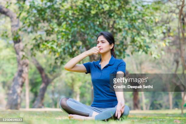 young woman - stock images - indian sports and fitness stock pictures, royalty-free photos & images