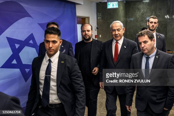 Israeli Prime Minister Benjamin Netanyahu arrives for the weekly meeting at the prime minister's office in Jerusalem on April 2, 2023.