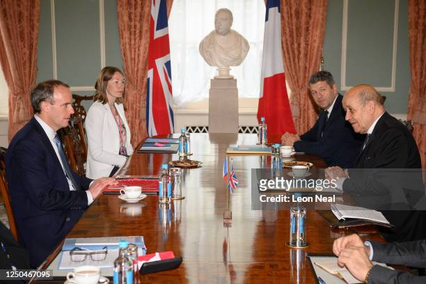 British Foreign Secretary Dominic Raab speaks with his French counterpart Jean-Yves Le Drian during a meeting on June 18, 2020 in London, England....