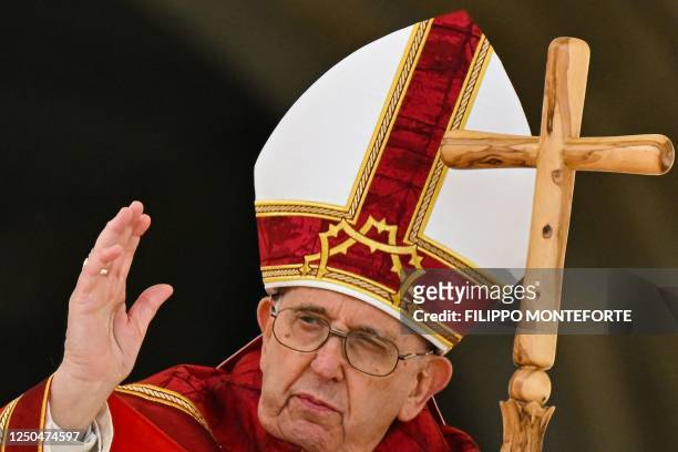 Pope Francis blesses the faithful as he delivers the Angelus prayer at the end of the Palm Sunday mass on April 2, 2023 at St. Peter's square in The...