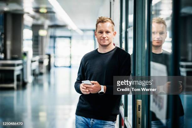 portrait of print factory senior employee - t shirt printing stock pictures, royalty-free photos & images