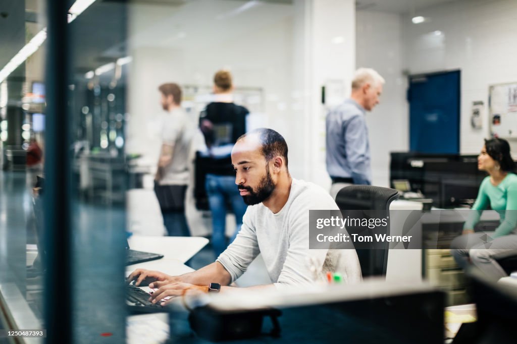 Busy Office In Large Printing Factory