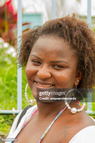 beautiful afro brazilian woman smiling, arraial do cabo, rio de janeiro, brazil - atalia stock pictures, royalty-free photos & images