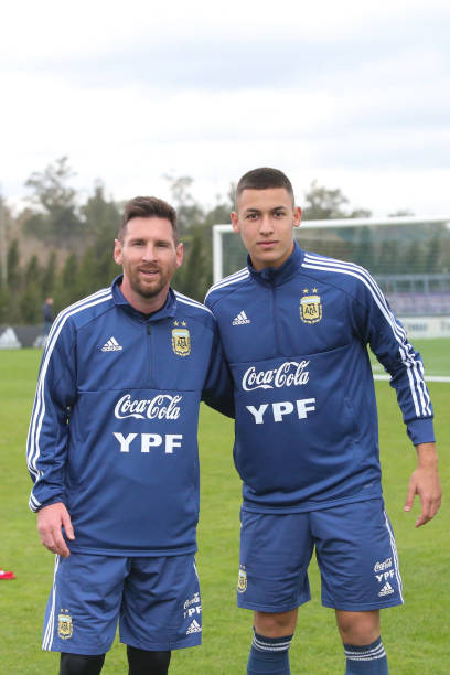 Tomas Lecanda poses with Lionel Messi during a training session at Julio H. Grondona Training Camp on May 30, 2019 in Ezeiza, Argentina.