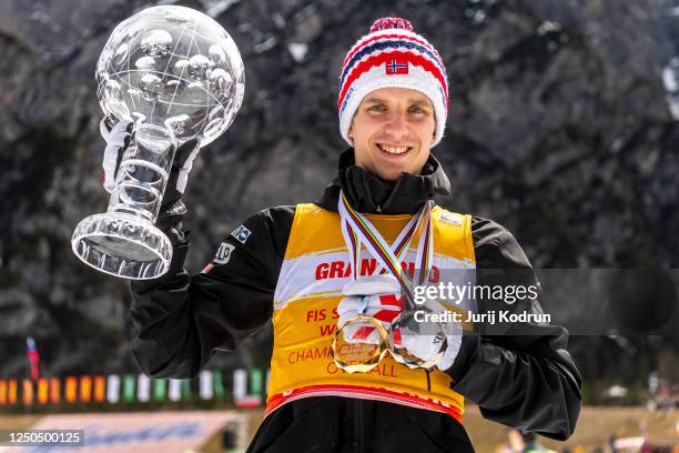 Overall season winner Halvor Egner Granerud of Norway poses with trophy after Individual HS240 at the FIS World Cup Ski Flying Men Planica on April...